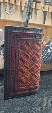 Mahogany and black roper wallet with hand cut basket pattern