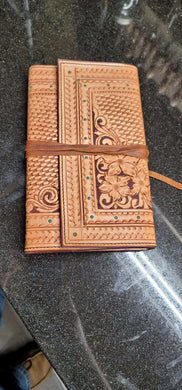 Journal with fully tooled leather cover